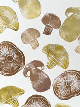 Load image into Gallery viewer, A white piece of paper with brown mushrooms printed onto it
