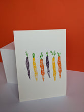 Load image into Gallery viewer, A white print with six colourful carrots printed on in shades of purple, yellow and orange