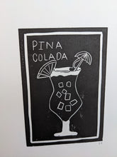 Load image into Gallery viewer, Close up of a black and white pina colada print