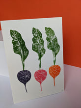 Load image into Gallery viewer, A print with three beetroot in purple, pink and orange with green leaves
