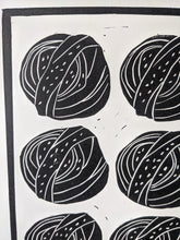 Load image into Gallery viewer, A close up of a black and white print of six cinnamon buns