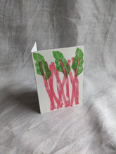 Load image into Gallery viewer, A white card printed with pink rhubarb stems and three green leaves
