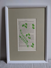Load image into Gallery viewer, A white frame with a green broad bean print on the inside
