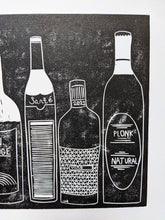 Load image into Gallery viewer, A black print of wine bottles on white paper