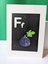Load image into Gallery viewer, A black print with a purple fig printed on it
