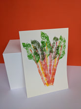Load image into Gallery viewer, Rainbow chard print on an orange background
