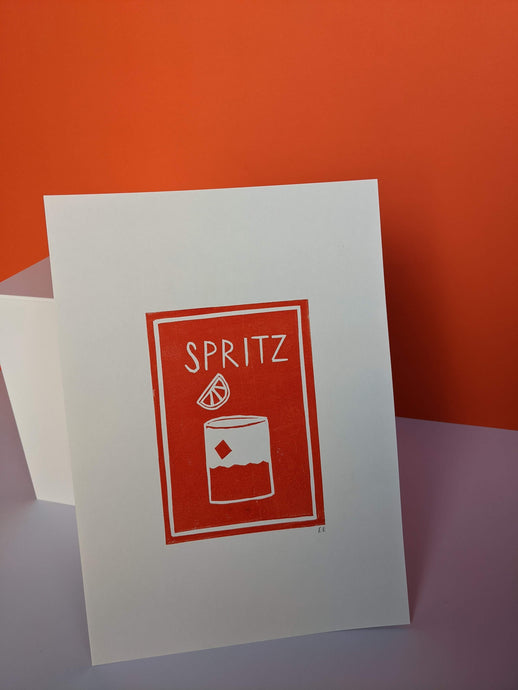 Orange spritz cocktail print on an orange background