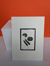 Load image into Gallery viewer, Black and white pastries print on an orange background
