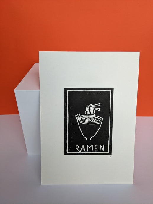 Monochrome ramen print against an orange background