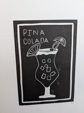 Load image into Gallery viewer, Close up of a black and white pina colada print
