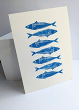 Load image into Gallery viewer, Seven blue printed sardines on white paper
