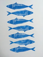 Load image into Gallery viewer, Seven blue printed sardines on white paper
