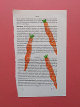 Load image into Gallery viewer, Three orange carrots printed onto old book paper
