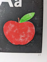 Load image into Gallery viewer, A black, white and red print of an apple with the letter A on it
