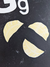 Load image into Gallery viewer, Three cream gyoza dumplings on a black print

