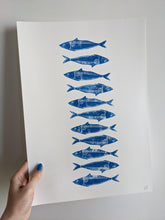 Load image into Gallery viewer, A white print with blue sardines printed on it
