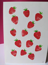 Load image into Gallery viewer, A close up of red strawberries with green tops, printed on white paper
